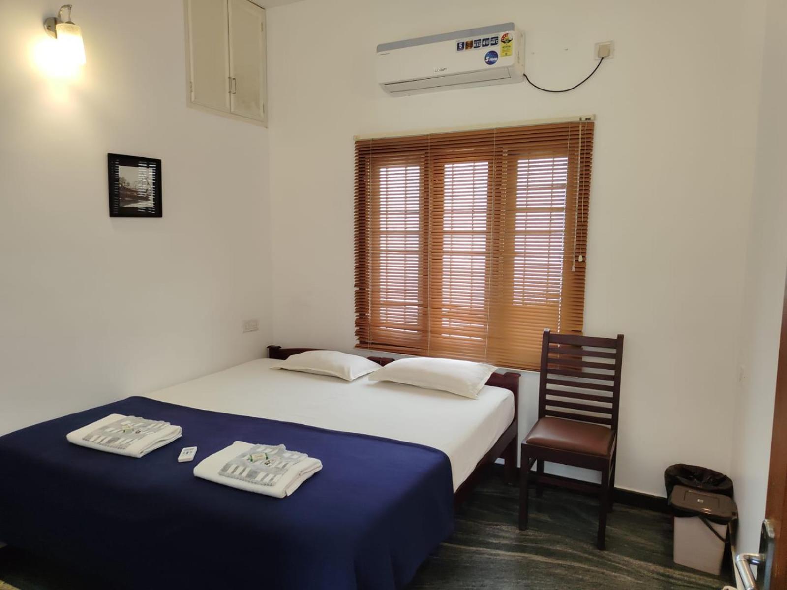 Janatha Homestay Kochi Phòng bức ảnh