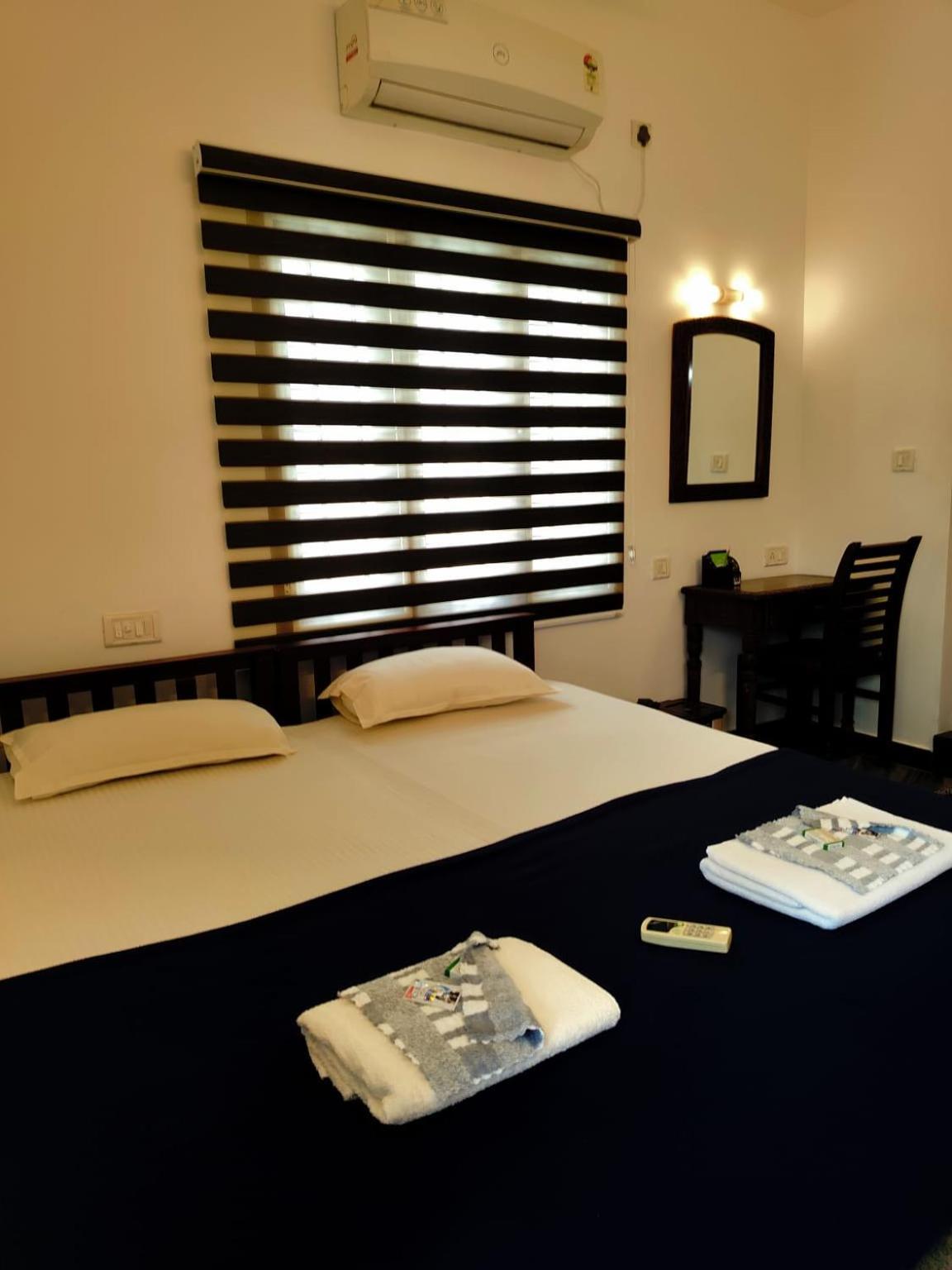Janatha Homestay Kochi Phòng bức ảnh
